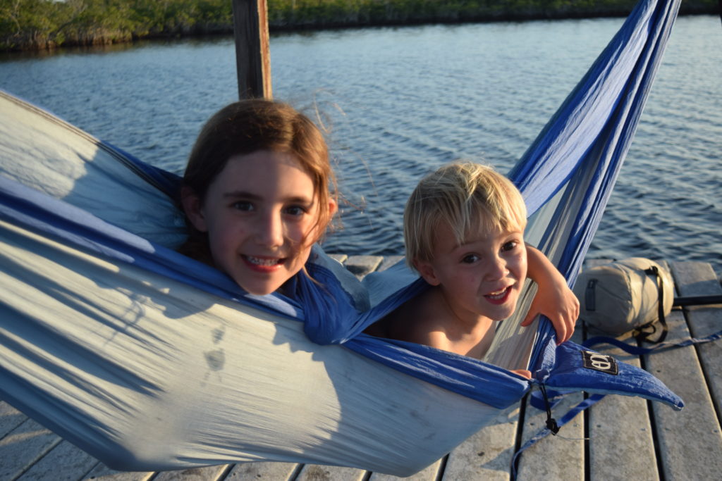 kids in a hammock on a chickee in the everglades